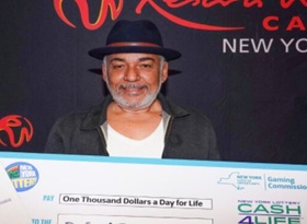 Rafael Gomez, ganador de lotería que recorre el pais en moto divulgando el evangelio.